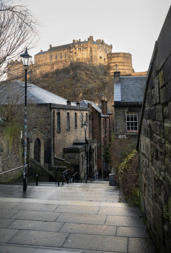 Steep stone steps climbing through Edinburgh's Old Town towards the castle