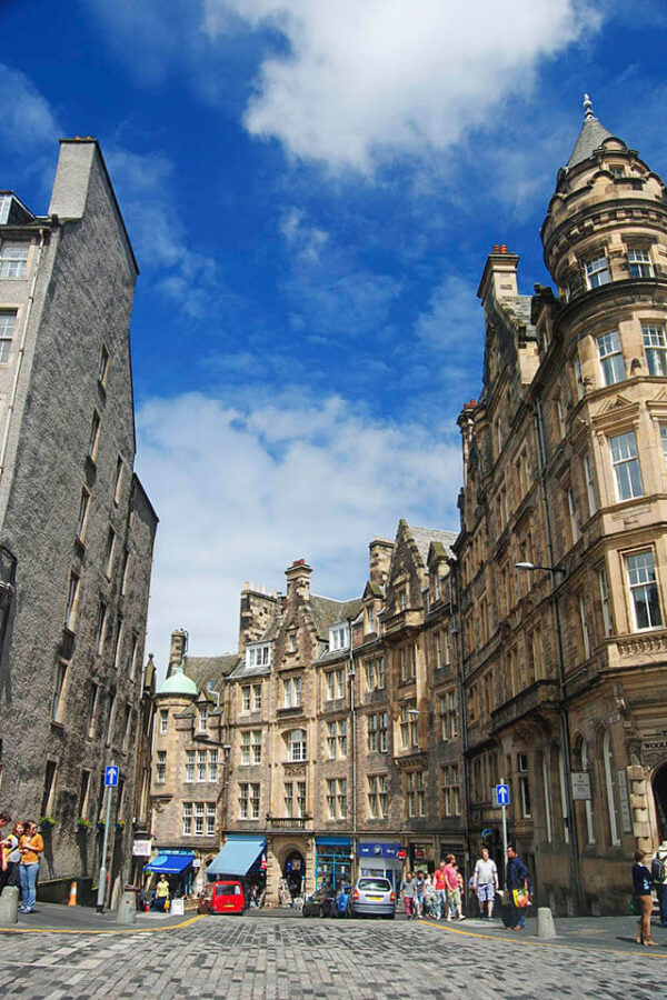 Cockburn Street curving uphill through Edinburgh's Old Town, cobbled and steep