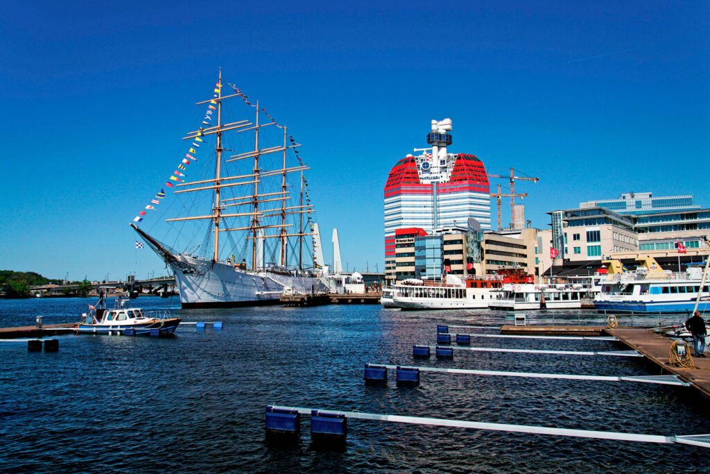 Gothenburg's working harbour with a tall ship moored at Lilla Bommen