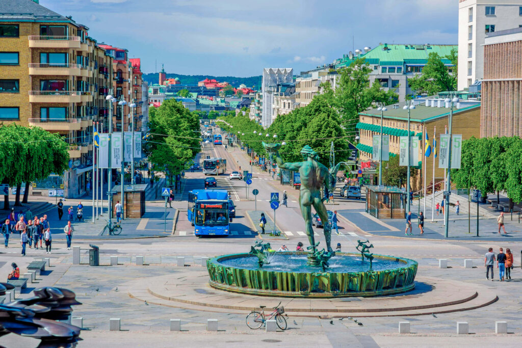 Kungsportsavenyen boulevard and the Poseidon fountain statue in Gothenburg