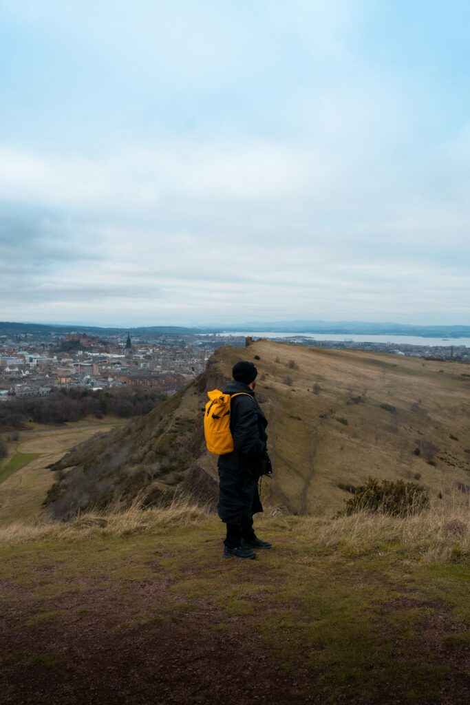 A walker on Salisbury Crags above Edinburgh