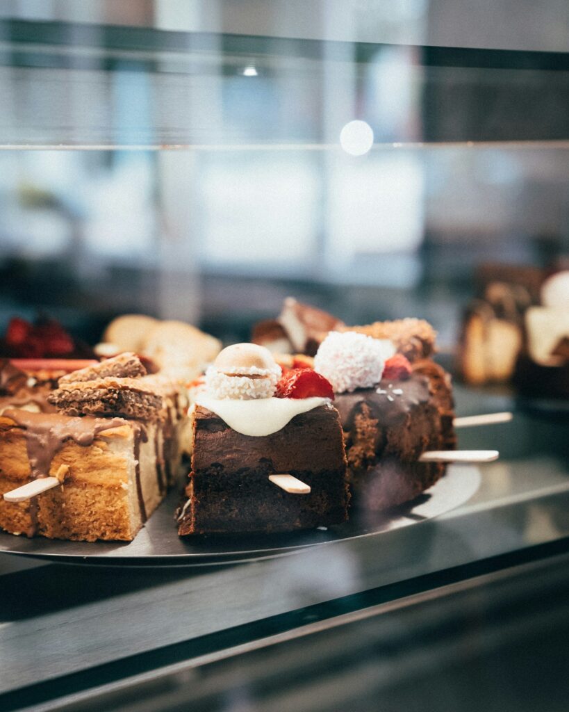 Cakes and pastries arranged in a Viennese café display case