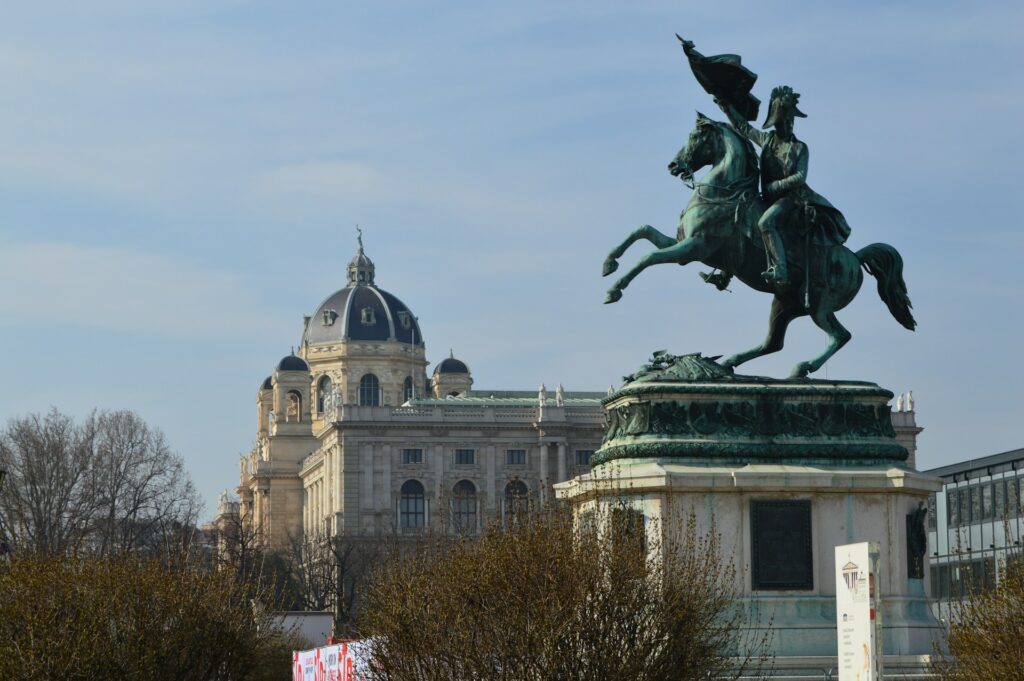 Heldenplatz in Vienna with an equestrian statue and a museum facade behind