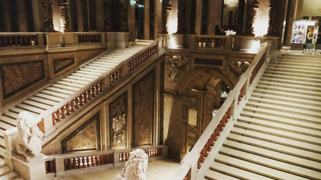 The grand marble staircase of the Kunsthistorisches Museum in Vienna